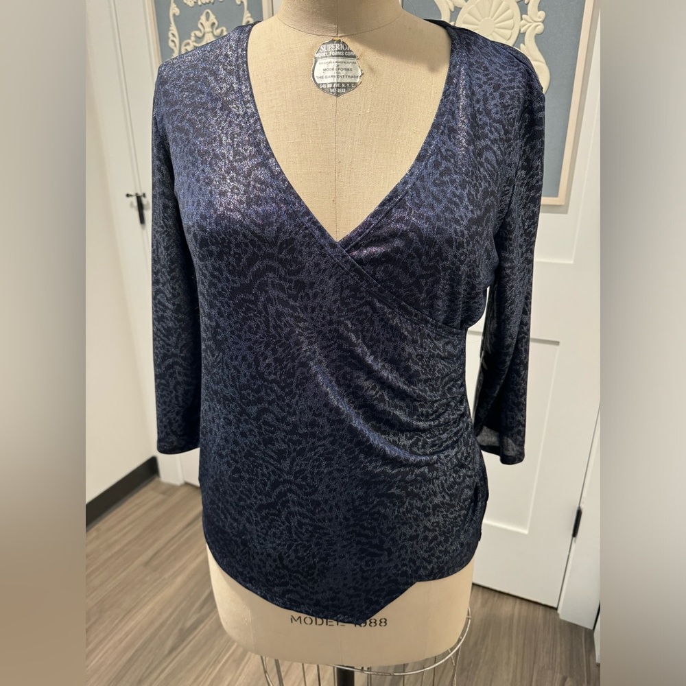 NWT Jennifer Lopez women’s asymmetrical top with animal print.  Size large.